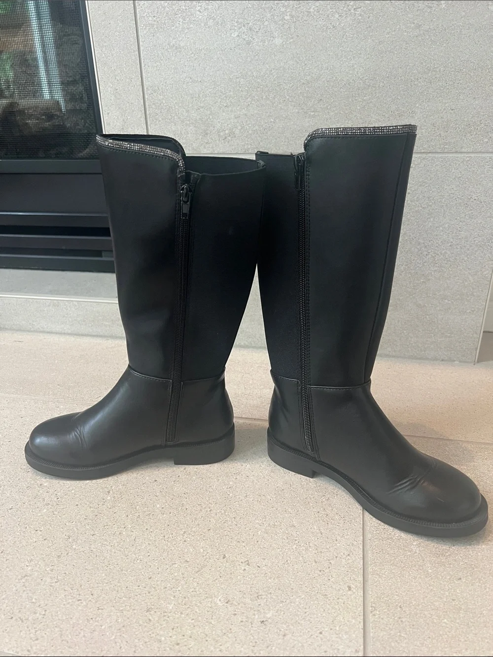 Tall girls black riding boot